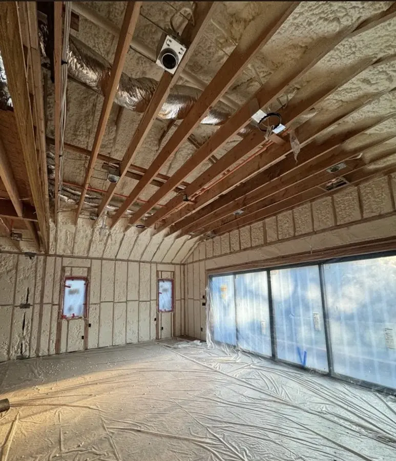 Interior walls and ceiling insulated with spray foam during new construction in Gardiner